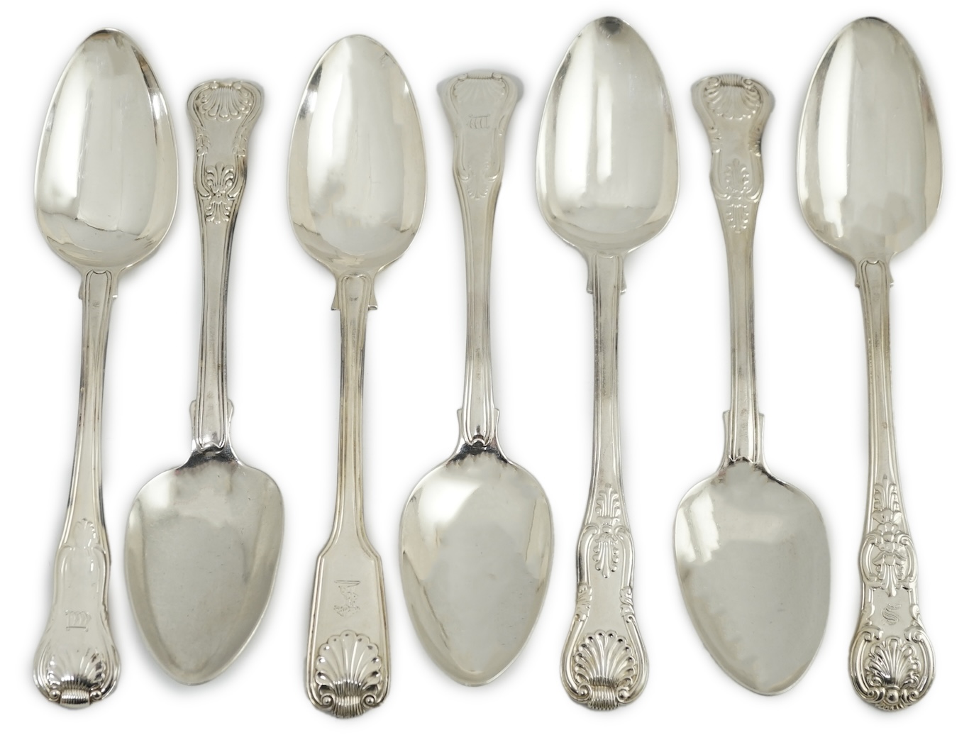 A harlequin set of six Georgian and Victorian silver Kings pattern table spoons, various dates and makers